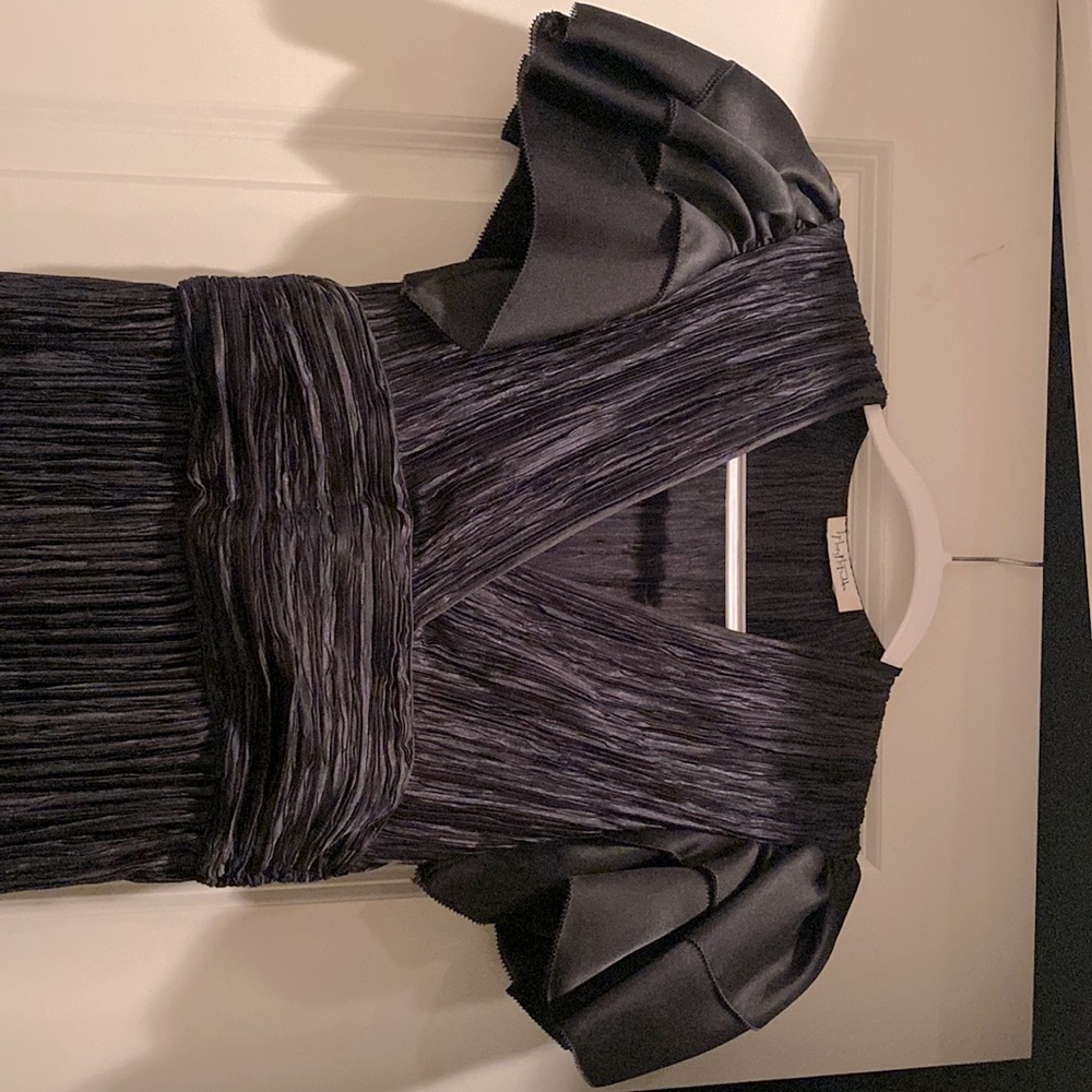 Authentic Mary McFadden black pleated dress. Side zipper